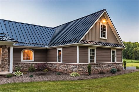 brick and stone house with metal roof|metal roofing for homes photos.